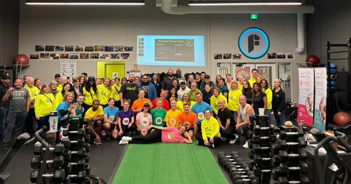 Photograph of many Fit Club members and Fit Coaches